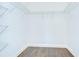 Walk-in closet featuring wood-look floors and wire shelving at 1210 Harbour Blue St, Ruskin, FL 33570