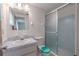 Bathroom vanity with shower and toilet in a neutral color scheme at 12220 Twin Branch Acres Rd, Tampa, FL 33626
