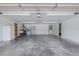 Spacious garage with laundry, utility sink, and plenty of storage area at 12220 Twin Branch Acres Rd, Tampa, FL 33626