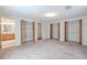 Main bedroom walk-in closets featuring shelving and rack storage at 12220 Twin Branch Acres Rd, Tampa, FL 33626