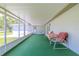 Comfortable screened-in patio with outdoor seating, perfect for enjoying peaceful moments at 12220 Twin Branch Acres Rd, Tampa, FL 33626