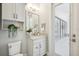 Modern bathroom features a sink with cabinet, and decorative decor at 125 Hidden Estates Ct, Brandon, FL 33511