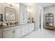 Spacious bathroom featuring double vanity with ample storage and stylish fixtures creating a functional space at 125 Hidden Estates Ct, Brandon, FL 33511