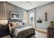 Cozy bedroom offers a relaxing sports-themed atmosphere with unique decor and soft lighting at 125 Hidden Estates Ct, Brandon, FL 33511