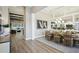 Elegant dining room with natural light, mirrored wall, stylish decor, and an open floor plan at 125 Hidden Estates Ct, Brandon, FL 33511