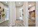 Hallway leading to the bathroom and walk in closet creating privacy and space from the main bedroom at 125 Hidden Estates Ct, Brandon, FL 33511