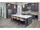 Well-appointed kitchen with a large island, counter seating, ample cabinetry, and stainless steel appliances at 125 Hidden Estates Ct, Brandon, FL 33511