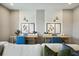 Bright office area with dual desks, modern lighting, and comfortable seating at 125 Hidden Estates Ct, Brandon, FL 33511