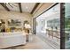 Indoor outdoor living with covered patio and views of the pool with beamed ceilings and outdoor dining at 125 Hidden Estates Ct, Brandon, FL 33511