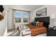 Stylish bedroom featuring a comfortable bed, bright natural light, and tasteful decor for a relaxing ambiance at 14040 Textile Run, Parrish, FL 34219