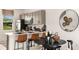 Well-designed kitchen boasts stainless appliances, a breakfast bar, and modern finishes at 14040 Textile Run, Parrish, FL 34219