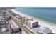 An aerial view of a beach front community, with new construction at 14048 Gulf Blvd # 302, Madeira Beach, FL 33708