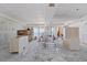 Unfinished living room featuring drywall, recessed ceilings, and sliding glass doors to a future balcony at 14048 Gulf Blvd # 302, Madeira Beach, FL 33708