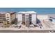 Exterior daytime aerial view of an apartment building still under construction near a beach with a beachfront view at 14048 Gulf Blvd # 201, Madeira Beach, FL 33708
