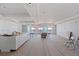 Spacious living room featuring recessed lighting and sliding glass doors that lead to a future balcony with beach views at 14048 Gulf Blvd # 201, Madeira Beach, FL 33708