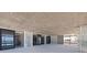 Unfinished living space with sliding glass doors that lead to a balcony offering breathtaking ocean views at 14048 Gulf Blvd # 201, Madeira Beach, FL 33708