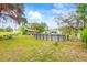 Spacious backyard features an above-ground pool and ample room for outdoor activities and entertainment at 14339 Mayer Ave, Hudson, FL 34669