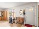 Inviting entryway features neutral decor and tile flooring, blending style and functionality at 14339 Mayer Ave, Hudson, FL 34669