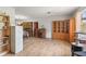Spacious living area with wood-look flooring, neutral walls, and ample room for furniture at 14339 Mayer Ave, Hudson, FL 34669
