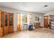 Bright living room features wood-look flooring and plenty of natural light at 14339 Mayer Ave, Hudson, FL 34669