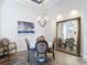Elegant dining room with a stylish chandelier and mirror at 1443 Obear Ct, Wesley Chapel, FL 33543