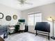 Comfortable office space with neutral colors, a ceiling fan, plenty of natural light, and modern floors at 1443 Obear Ct, Wesley Chapel, FL 33543