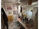 Bathroom features a toilet, sink, mirror, and framed art pieces hanging on the wall at 1559 San Roy Dr, Dunedin, FL 34698