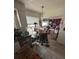 Bright kitchen featuring a cozy breakfast bar and a view into the living area, perfect for entertaining at 1559 San Roy Dr, Dunedin, FL 34698