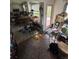 View of a kitchen featuring a wooden bar and countertop with some decorative toys on the floor at 1559 San Roy Dr, Dunedin, FL 34698