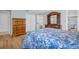 Spacious bedroom featuring a dresser, closet and wood flooring at 1598 Brookside Blvd, Largo, FL 33770