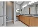 Bright bathroom features and sinks, vanity area and ample cabinet space at 1643 Emerald Dunes Dr, Sun City Center, FL 33573
