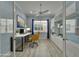 Bright and modern home office with white built-ins, a comfortable workspace, and natural light at 1643 Emerald Dunes Dr, Sun City Center, FL 33573