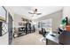 Bright home office with desk, chair, bookshelves, and a window with natural light at 17610 Buckingham Garden Dr, Lithia, FL 33547