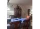 Cozy dining room with wood furniture and natural light at 18063 Parrot Rd, Weeki Wachee, FL 34614