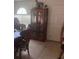 Cozy dining room with wood furniture and natural light at 18063 Parrot Rd, Weeki Wachee, FL 34614