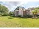 Charming home with brick accents, manicured landscaping, and a well-maintained lawn at 1815 Durant Rd, Valrico, FL 33596