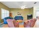 Inviting living room with hardwood floors, comfortable seating, and neutral wall color at 1815 Durant Rd, Valrico, FL 33596