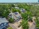 Aerial view of a charming home with solar panels in a leafy neighborhood near downtown at 1825 2Nd S St, St Petersburg, FL 33705