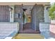 Inviting front entrance features a secure gated entry and decorative exterior lighting at 1825 2Nd S St, St Petersburg, FL 33705