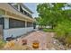 Charming home exterior with well-maintained landscaping and brick walkway at 1825 2Nd S St, St Petersburg, FL 33705