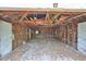 Open garage, ready for renovations with exposed framing and lots of potential at 1825 2Nd S St, St Petersburg, FL 33705