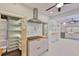 Kitchen featuring pantry with adjustable shelving and modern appliances at 1825 2Nd S St, St Petersburg, FL 33705