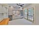 Kitchen featuring stainless steel appliances, custom cabinets and access to outdoor space at 1825 2Nd S St, St Petersburg, FL 33705