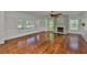 Spacious living room features a fireplace, large windows, and hardwood floors at 1825 2Nd S St, St Petersburg, FL 33705
