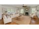 Bright and inviting living room with a cozy fireplace and stylish, neutral decor at 1825 2Nd S St, St Petersburg, FL 33705