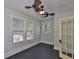 Bright home office featuring a ceiling fan, lots of natural light, and neutral walls and trim at 1825 2Nd S St, St Petersburg, FL 33705