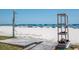 Convenient beach shower and shelving, adding practical features for a comfortable beach experience at 18400 Gulf Blvd # 2505, Indian Shores, FL 33785