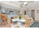 Dining area featuring seating for four and views into the kitchen at 18400 Gulf Blvd # 2505, Indian Shores, FL 33785