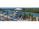 Spacious lot featuring a modern style home with river views and mature palms at 18400 Gulf Blvd # 2505, Indian Shores, FL 33785