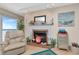 Living room fireplace featuring ocean view at 18400 Gulf Blvd # 2505, Indian Shores, FL 33785